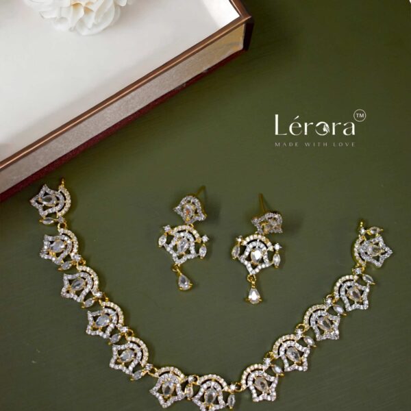 LERORA White and Gold Bell Designer Set for women. LJ18